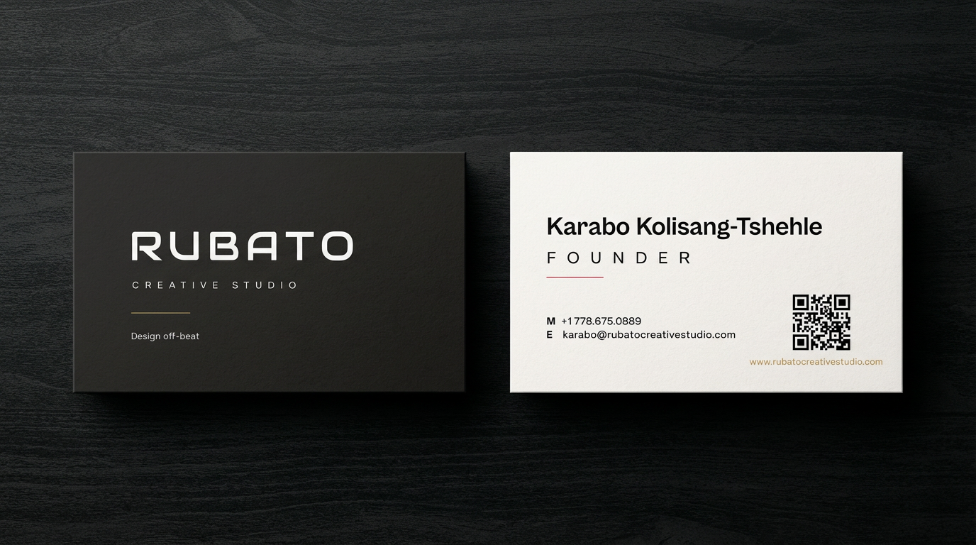 Rubato Creative Studio business cards on dark wood